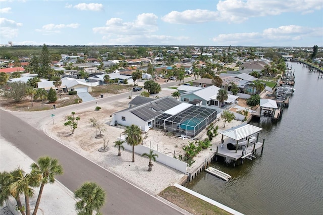 aerial view with a water view and a residential view