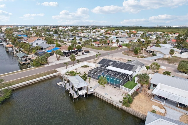 aerial view featuring a water view and a residential view