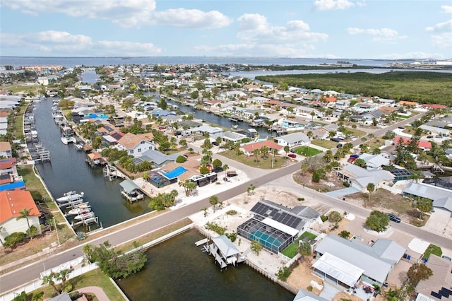 aerial view featuring a water view and a residential view