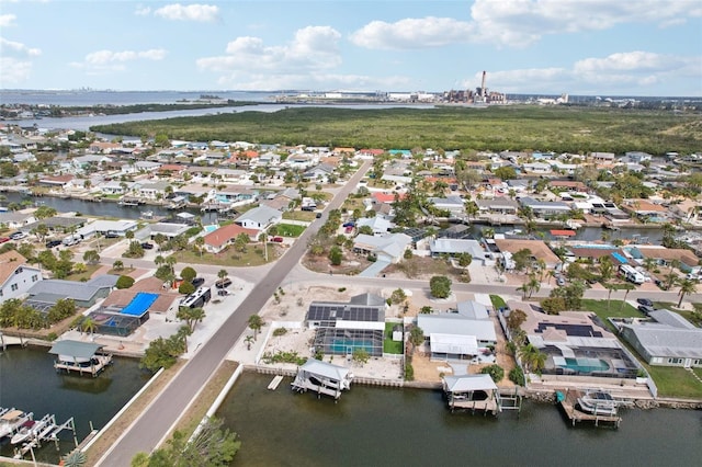 aerial view with a water view and a residential view