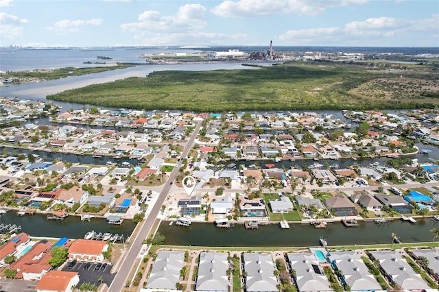 bird's eye view with a water view and a residential view