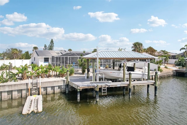 view of dock with a water view, boat lift, a lanai, and fence