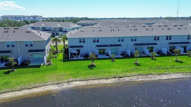 aerial view featuring a water view and a residential view