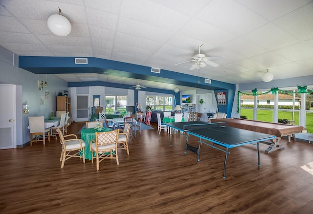 recreation room featuring visible vents and wood finished floors