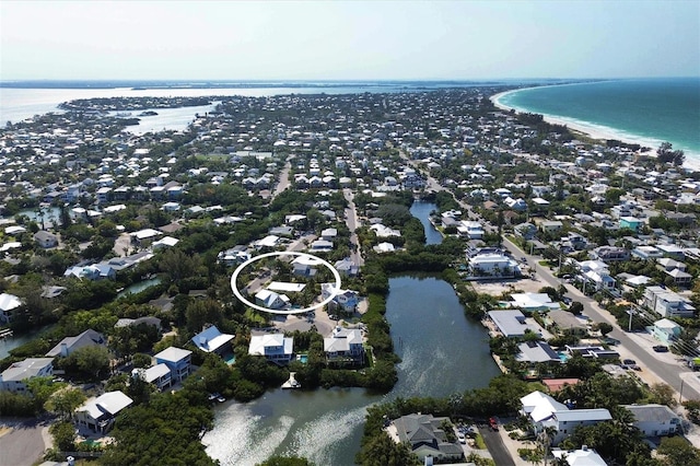 bird's eye view with a water view and a residential view