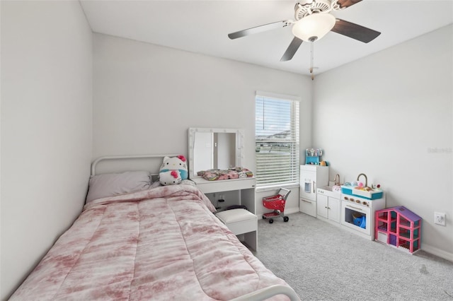 bedroom with ceiling fan and carpet