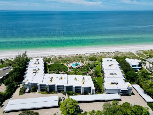 aerial view featuring a water view and a view of the beach