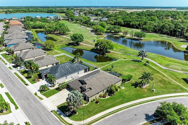 bird's eye view with a residential view and a water view