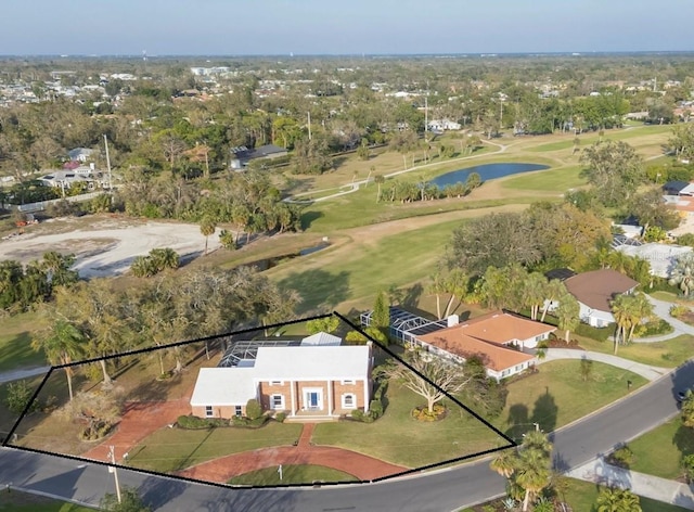 bird's eye view featuring view of golf course and a water view