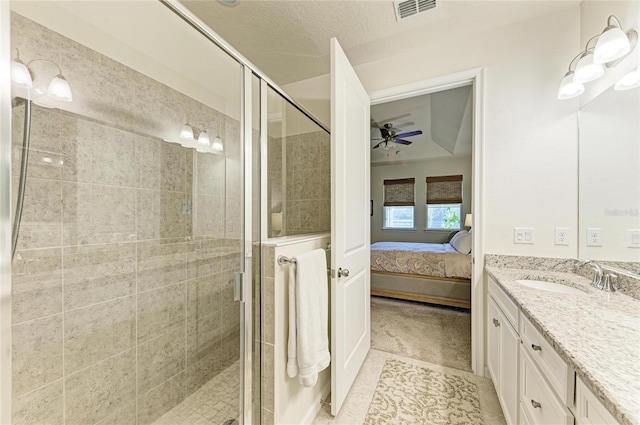 full bathroom with vanity, a stall shower, ensuite bath, and visible vents