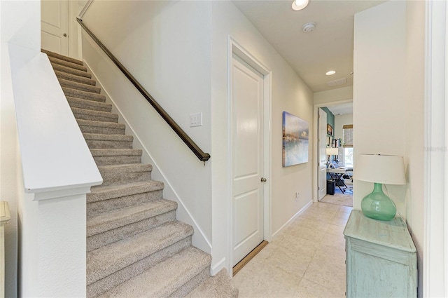 stairs with baseboards, tile patterned flooring, and recessed lighting