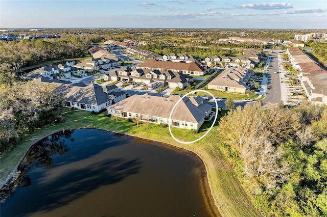 aerial view featuring a water view and a residential view