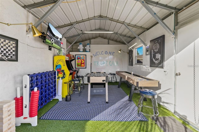 game room featuring vaulted ceiling