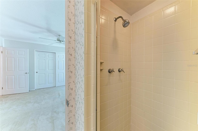 full bath featuring a shower stall and ceiling fan