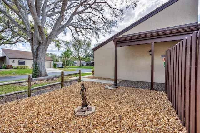 view of yard with fence and a residential view