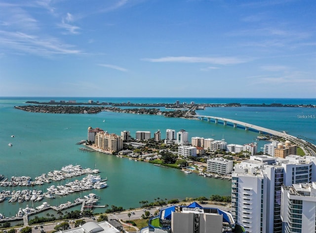 bird's eye view featuring a view of city and a water view