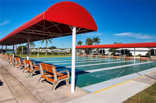 view of property's community with shuffleboard