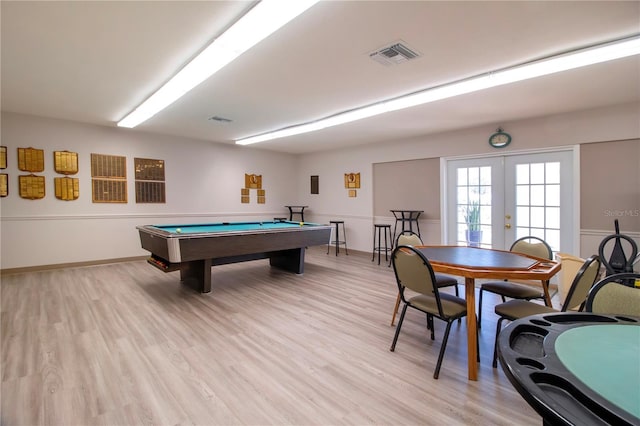 game room with light wood-type flooring, pool table, visible vents, and french doors