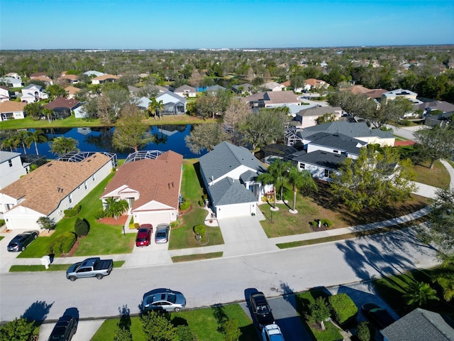 aerial view featuring a water view and a residential view