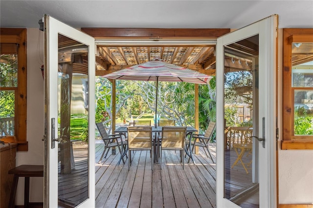 entryway with hardwood / wood-style flooring