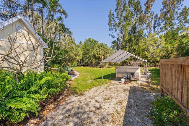 view of yard with fence