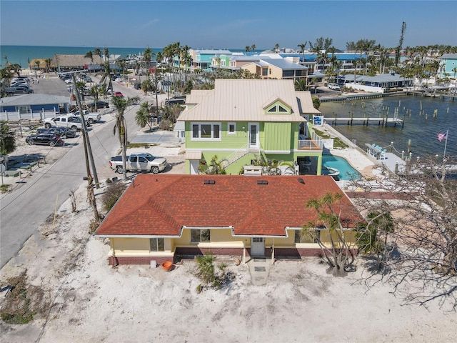 drone / aerial view featuring a water view