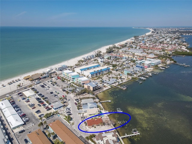 bird's eye view with a view of the beach and a water view