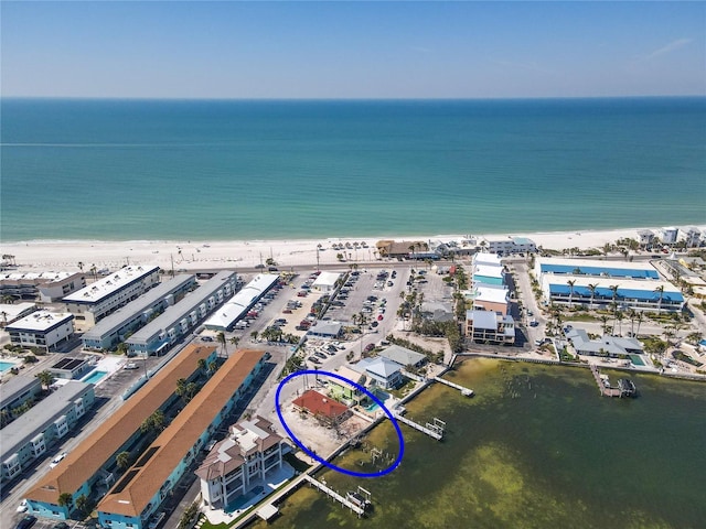 aerial view with a beach view and a water view