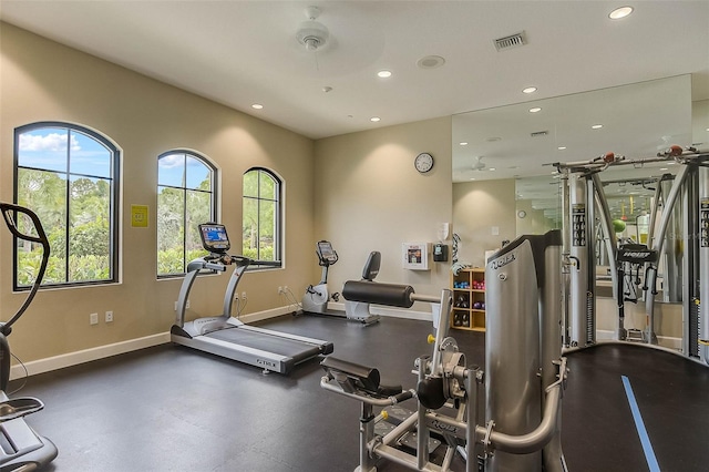 exercise room with recessed lighting, baseboards, and visible vents