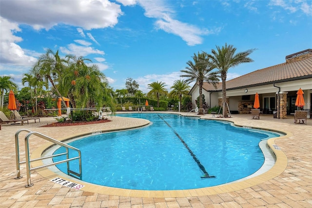 community pool featuring a patio