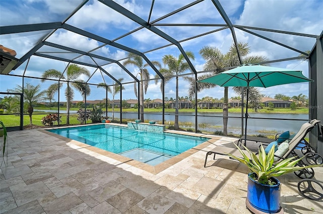 outdoor pool featuring a patio, a water view, and a lanai