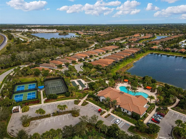 birds eye view of property featuring a water view