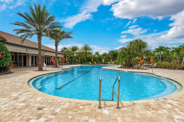 pool with a patio