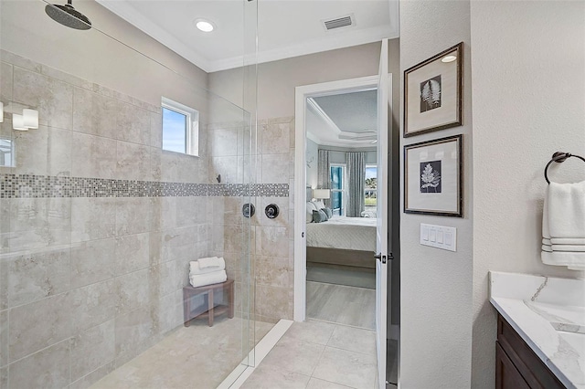 full bathroom with crown molding, walk in shower, visible vents, and connected bathroom