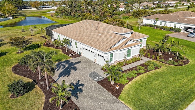 birds eye view of property featuring a water view and a residential view