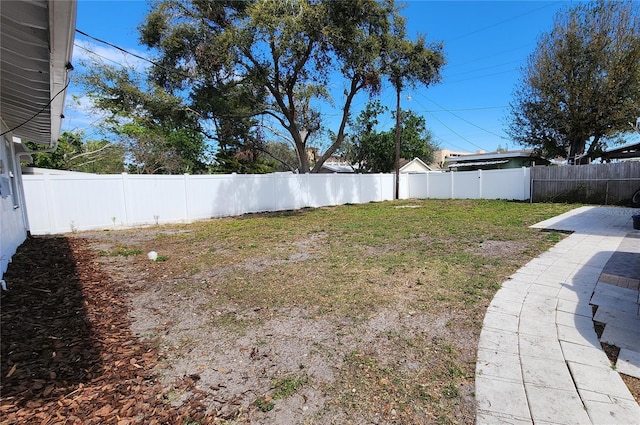 view of yard featuring a fenced backyard