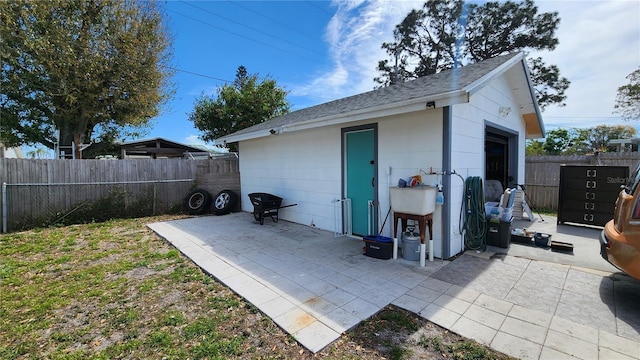 garage with fence