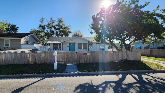 view of front of home featuring a fenced front yard