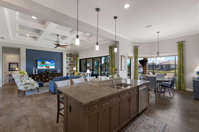 kitchen featuring visible vents, coffered ceiling, dishwasher, an island with sink, and a sink