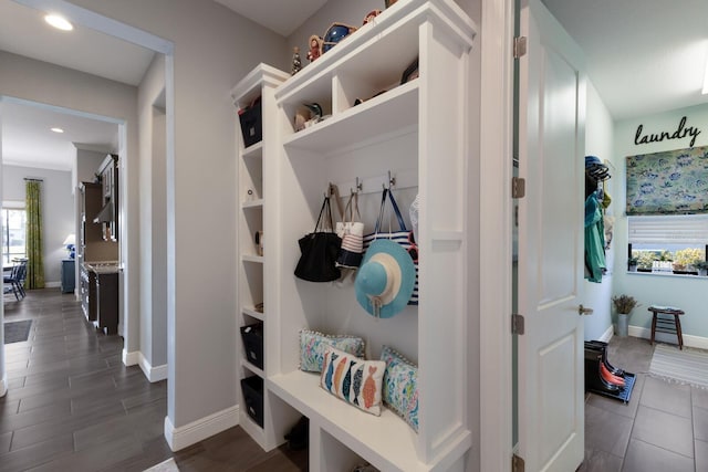 mudroom with baseboards, wood finished floors, and recessed lighting