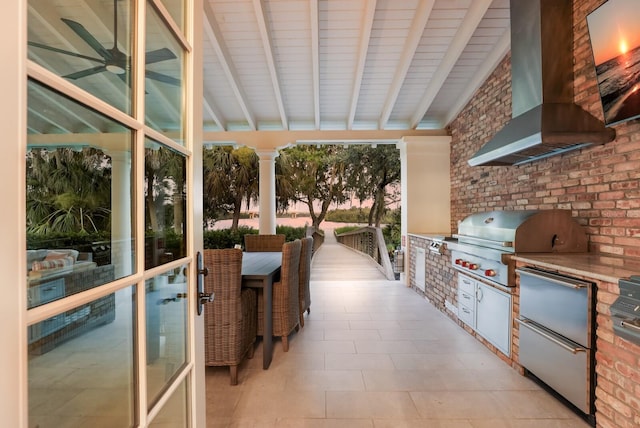 view of patio / terrace featuring an outdoor kitchen and grilling area