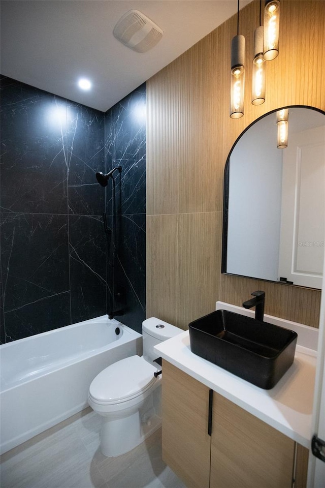 full bathroom with recessed lighting, visible vents, toilet, washtub / shower combination, and vanity