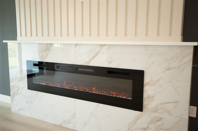 details featuring a premium fireplace