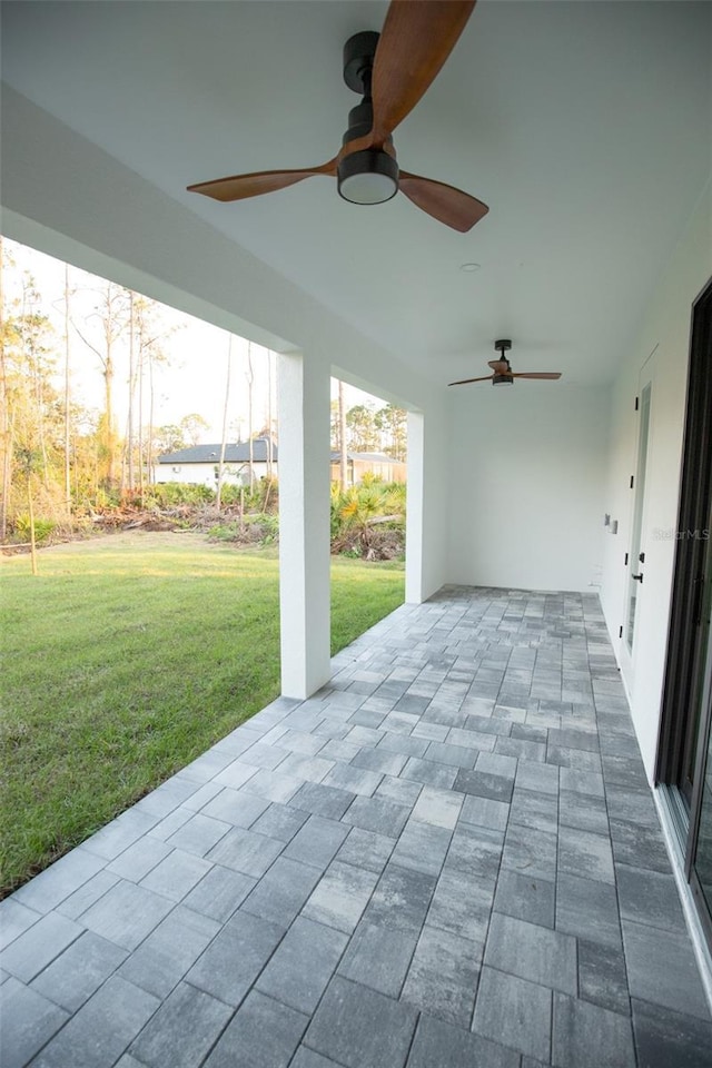 view of patio featuring a ceiling fan