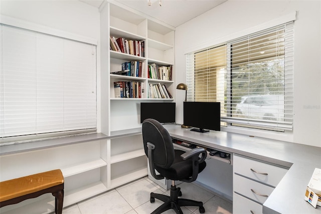 office with light tile patterned floors