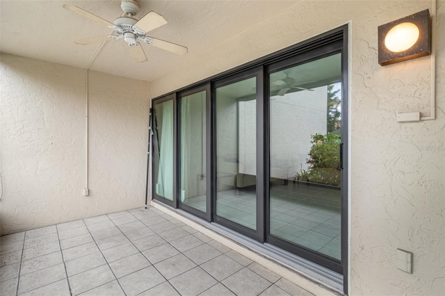 balcony featuring ceiling fan