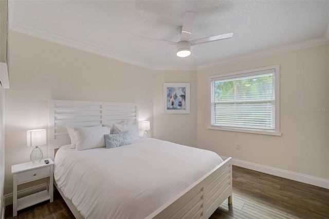 bedroom with ceiling fan, ornamental molding, dark wood finished floors, and baseboards