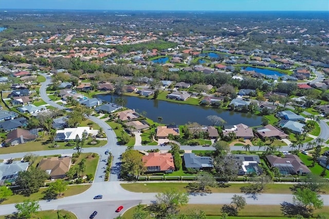 aerial view with a water view and a residential view