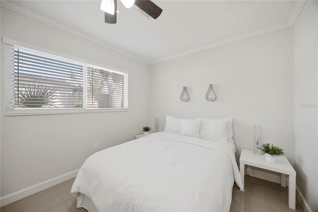 tiled bedroom featuring crown molding, ceiling fan, and baseboards