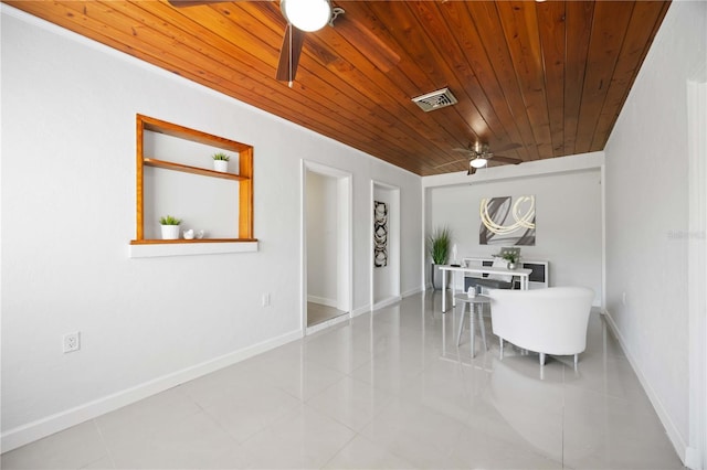 tiled dining space featuring wooden ceiling, visible vents, ceiling fan, and baseboards